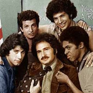 The cast of Welcome Back, Kotter. Mr. Kotter surrounded by the Sweathogs