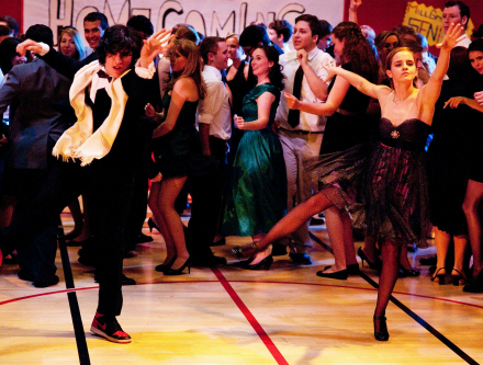 Patrick and Sam doing a choreographed dance at a school dance