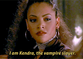 Buffy, in a fighting stance, facing off with Kendra, a young Black woman