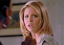 Buffy, in a fighting stance, facing off with Kendra, a young Black woman