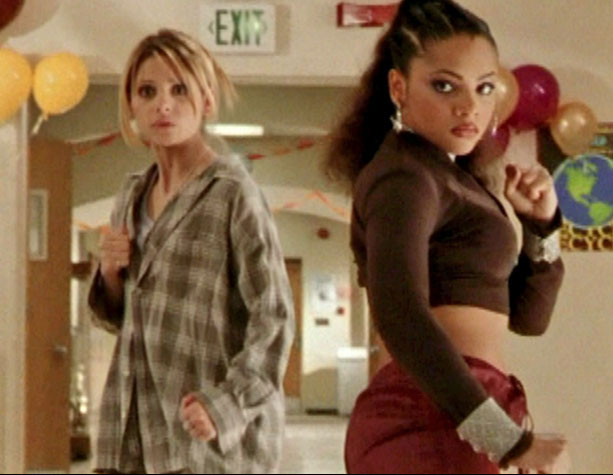 Buffy and Kendra, standing next to each other in fighting stances