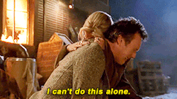 Buffy rescuing Giles from a burning building and then hugging him