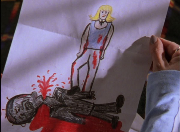 A crayon drawing of Buffy standing over a beheaded and bloody monster
