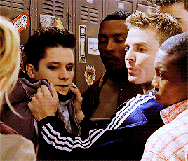 Buffy stops some bullies from roughing up a student by simply making eye contact with them