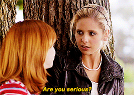 Willow and Buffy talking under a tree and then hugging