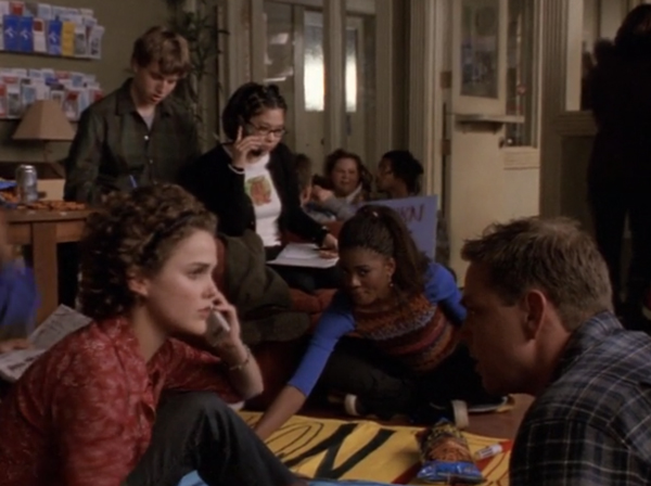 Felicity, Elena, and other students doing a sit-in at the clinic