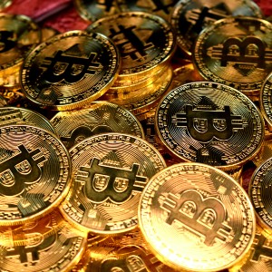 A pile of golden bitcoins