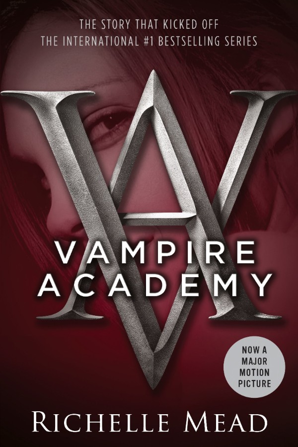 Cover of Vampire Academy, with a girl's face behind a big VA