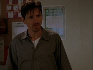 actor John Hawkes as the janitor