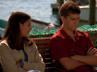 Joey and Pacey sit on a bench
