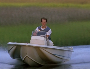 Dawson heads to pick up Joey for their date in a speed boat