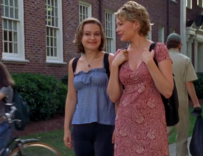 Abbie wears a light blue baby-doll camisole and Jen wears a mauve babydoll dress. Both look super '90s, Delia's-style