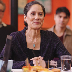 Sakina Jaffrey, an older Indian American woman, as Helen 