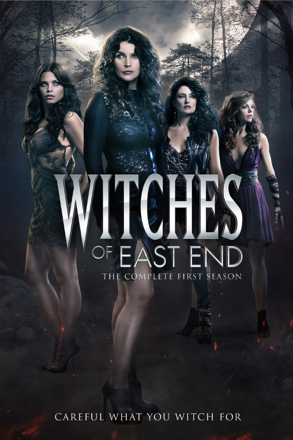 The 4 main characters, dressed in black, look like badass witches