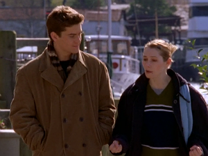 Pacey and Andie walk together at the fair, and Pacey's wearing a flattering coat and scarf