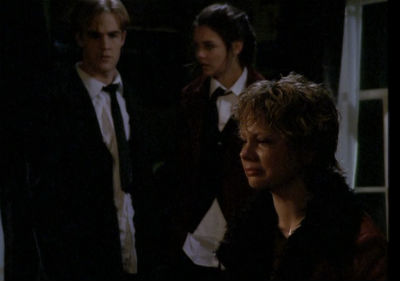 Jen sits in a dark room, sobbing, while Dawson and Joey look on, concerned. 
