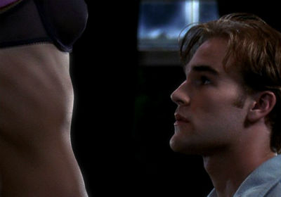 Dawson stares at a naked lady torso (the head and face are off-camera), looking VERY nervous