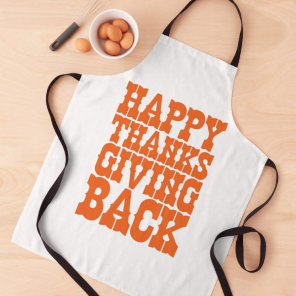 Apron with "Happy Thanksgiving Back" written on it in orange, Zabar's style font