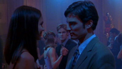 Jack and Joey stare intensely at each other while Dawson and Jen dance in the background, Dawson watching them suspiciously
