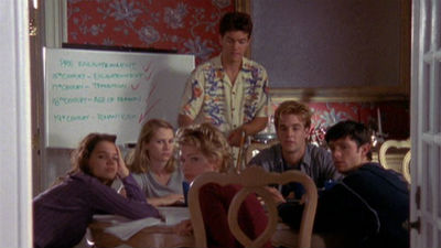 Joey, Pacey, Dawson, Andie and Chris Wolfe sit around a kitchen table, looking exhausted after an all-night study session