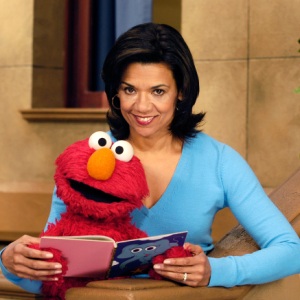 Sonia Manzano as Maria, on the set of Sesame Stree with Elmo