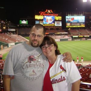 Brian and his wife Sandy at a Cardinals game