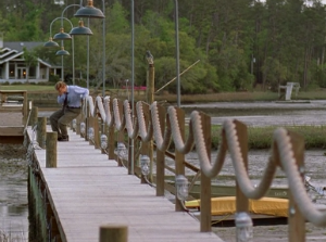 Dawson crouches over on the pier in emotional agony, but it looks like he’s in physical agony.