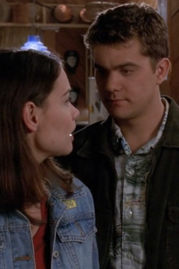 Joey and Pacey look at each other with a LOT of tension.