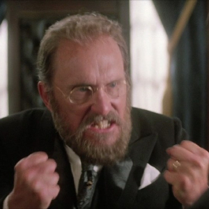 Robert Duvall as Joseph Pulitzer, an older white man with a beard and glasses