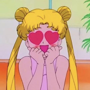 Sailor Moon with literal heart eyes.