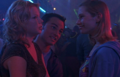 Jen, Jack and Andie are at a rave, surrounded by partiers in neon lights