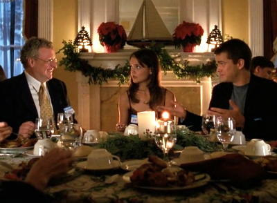 Pacey, Joey and the dean of Worthington College sit around a table at a fancy dinner