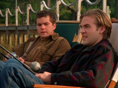 Pacey and Dawson sit on the pier, fishing and chatting