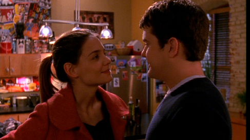 Joey and Pacey grin at each other cutely in his apartment