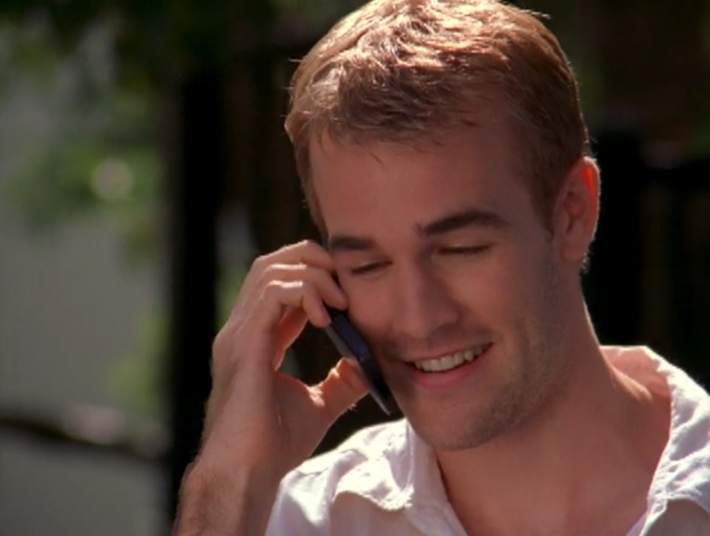 Dawson, on the phone, with a really good haircut and looking hot