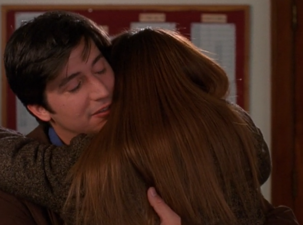 Wilder hugs Joey, his face buried in her hair