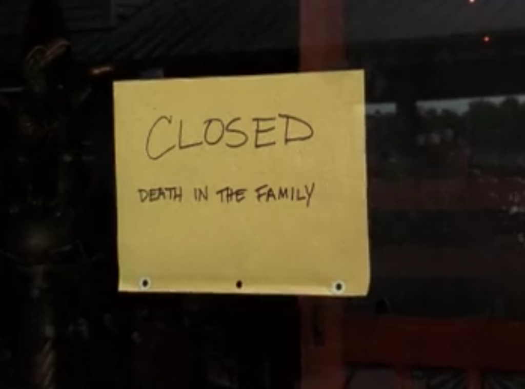 A sign posted on the door of Leery's Fresh Fish reading "Closed: Death in the Family"