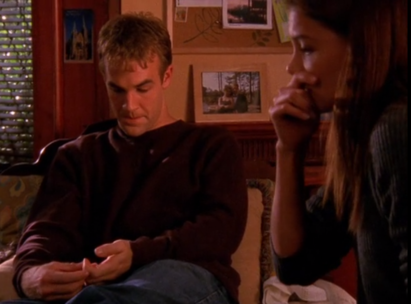 Joey and Dawson sitting together in her dorm room, looking miserable