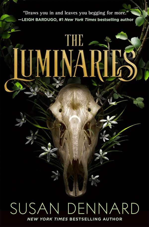 Cover of The Luminaries, featuring an animal skull surrounded by flowers and branches on a dark background