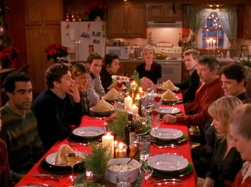 Dawson's Crew, including extended family and plus ones, sit around the Christmas table in Capeside