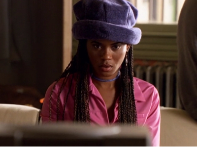 Elena wearing a giant purple crushed velvet sorta soft top hat?