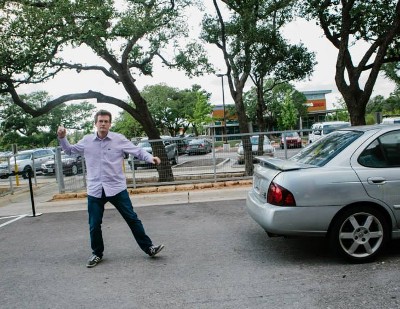 John Green, getting ready to throw an egg at a car