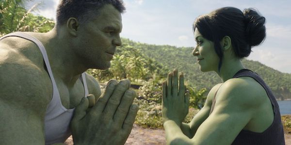 Hulk and She-Hulk face each other with hands folded