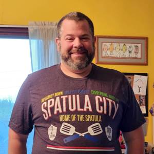 Brian in a Spatula City shirt