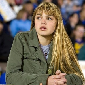 Julie Taylor, a pretty teenage white girl with long blonde hair and bangs