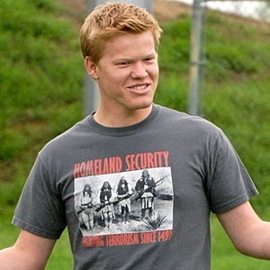Landry, a slightly dorky looking white guy with reddish blonde hair wearing a tshirt