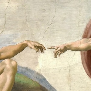 A close up shot of outstretched arms from Michelangelo's The Creation of Adam