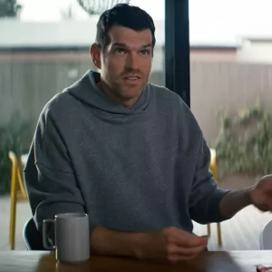 Timothy Simons, a tall white man with a short brown hair and a goofy expression