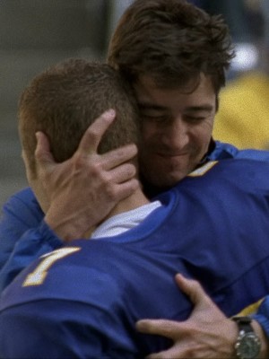 Coach Taylor hugs Matt Saracen at the end of the game