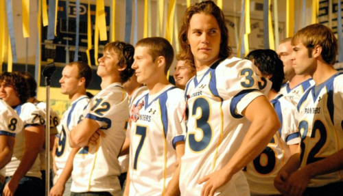 Zach Gilford as Matt Saracen and Taylor Kitsch as Tim Riggins in Friday Night Lights